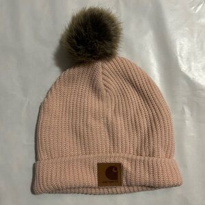 Blush pink Carhartt beanie with fur pom